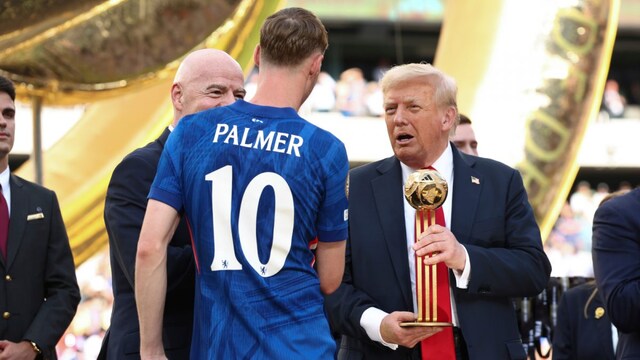 Cole Palmer receiving the Player of the Match award from Donald Trump (AP)