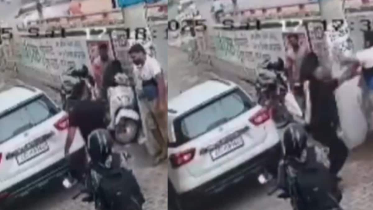 Biker Slaps And Kicks Car Driver, Then Barely Escapes Being Run Over | Video Biker Slaps And Kicks Car Driver, Then Barely Escapes Being Run Over | Video
