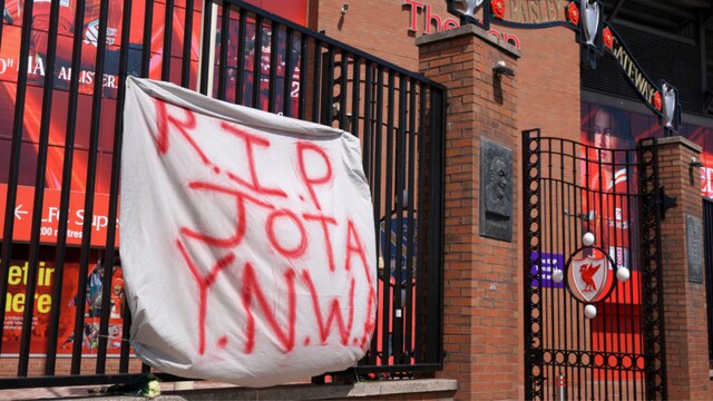A banner in memory of Diogo Jota is fixed on a fence at Liverpool FC's Anfield (AP)