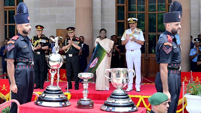 President Murmu with the trophies. (Govt. of India)