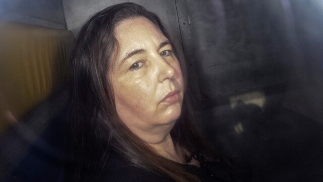 Erin Patterson arriving in the back of a prison transport vehicle at Latrobe Valley Magistrate's Court in Morwell, Australia. (AFP file photo)
