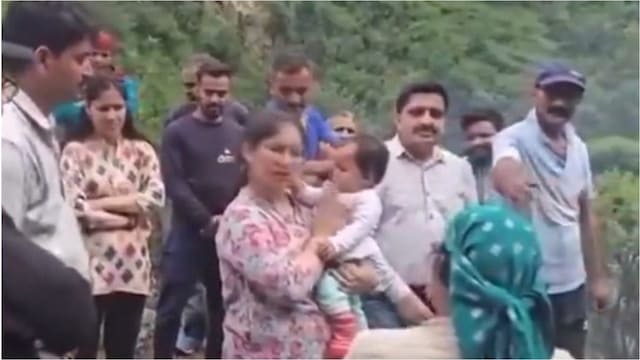 Neighbours, who lived on higher ground, made their way down to the family's home around 2 am, fearing the worst.