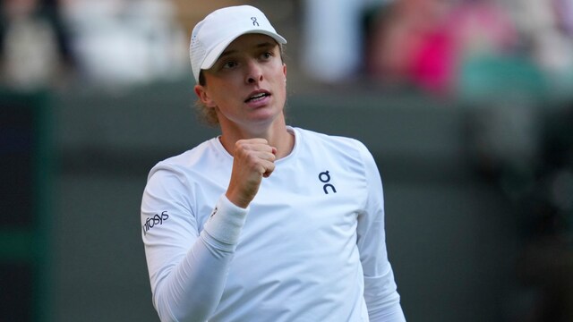 Iga Swiatek celebrates after winning a point. (AP Photo)