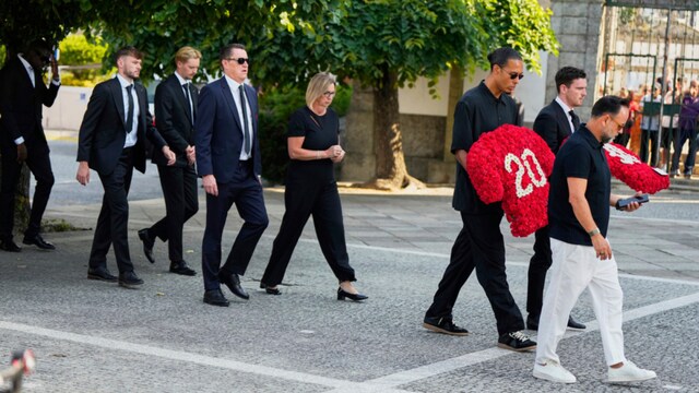 Liverpool players walk to the church to attend the funeral of their teammate Diogo Jota and his brother Andre Silva, in Gondomar, near Porto, Portugal (AP)