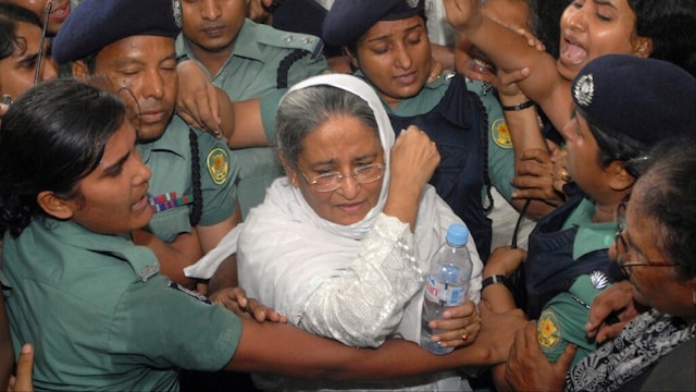 Police escort former Bangladeshi Prime Minister and Awami League President Sheikh Hasina (File photo/AP)