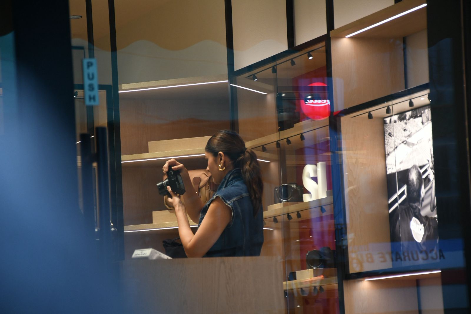 Who is she capturing through her camera lens? (Image: Viral Bhayani)
