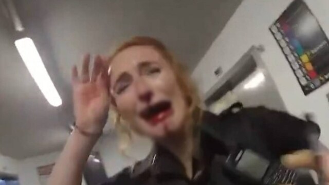 Blood is seen pouring from PC Ward’s nose as she sobs and is comforted by a colleague.