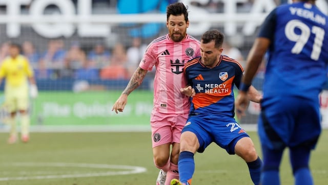 FC Cincinnati's Pavel Bucha, right, kicks the ball away from Inter Miami's Lionel Messi during the first half of an MLS soccer match, Wednesday, July 16, 2025, in Cincinnati. (AP Photo/Jay LaPrete)
