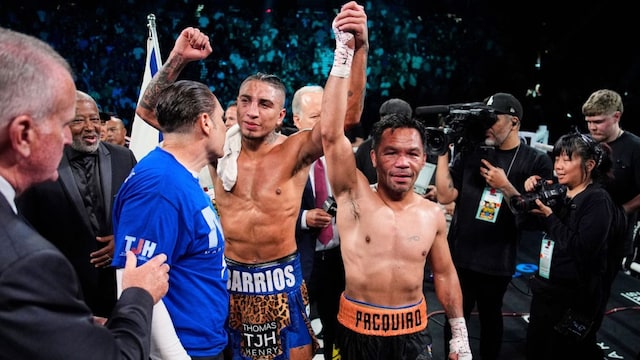 Mario Barrios, left, and Manny Pacquiao reacts after fighting to a majority draw in a welterweight title boxing match Saturday, July 19, 2025, in Las Vegas. (AP Photo/John Locher)
