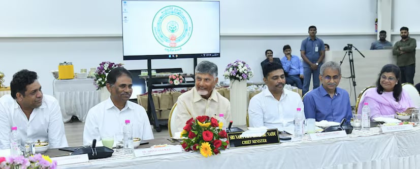 These new passbooks will be technology-enabled, with each containing a QR code. Landowners will be able to scan the code and enter their Aadhaar number to access detailed information about their land. The details will instantly appear on their mobile screens. The CM has stressed that landowners must have full awareness of the location and particulars of their property. This digital solution is expected to provide greater security and help prevent land encroachments. (News18 Telugu) These new passbooks will be technology-enabled, with each containing a QR code. Landowners will be able to scan the code and enter their Aadhaar number to access detailed information about their land. The details will instantly appear on their mobile screens. The CM has stressed that landowners must have full awareness of the location and particulars of their property. This digital solution is expected to provide greater security and help prevent land encroachments. (News18 Telugu)