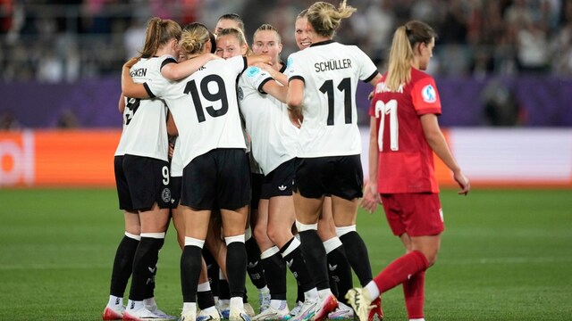 German players celebrate after scoring the opening goal. (AP Photo)