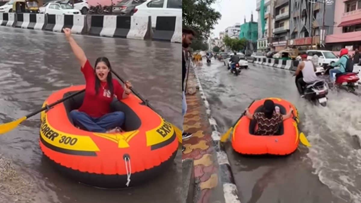Watch: Couple’s Inflatable Boat Draws Crowd On Waterlogged Road