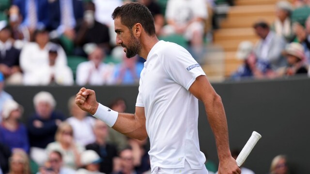 Marin Cilic reacts during his men's singles fourth round match against Flavio Cobolli. (AP Photo)