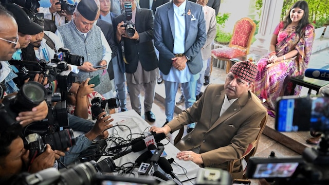 Nepal's former King Gyanendra Shah (C) speaks with media on his birthday at his residence in Kathmandu on July 7, 2025. (AFP photo)