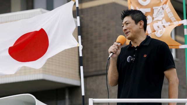 Sohei Kamiya, leader of the Sanseito party, speaks during an election campaign in Tosu, Saga prefecture, southwestern Japan, on July 12. (Kyodo News via AP)