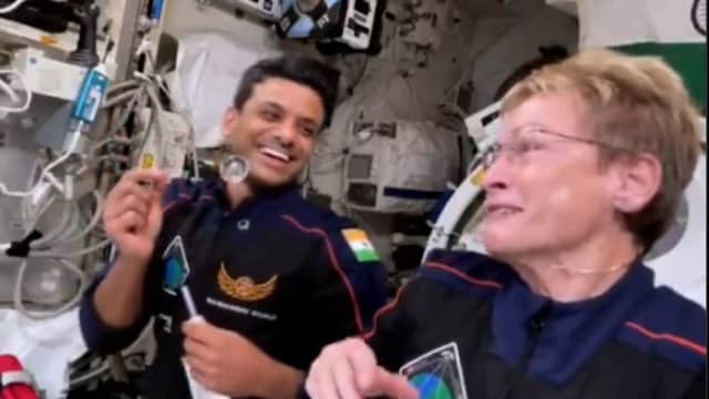 In the video, the two astronauts shared a light-hearted moment, laughing as the water orb floated between them.