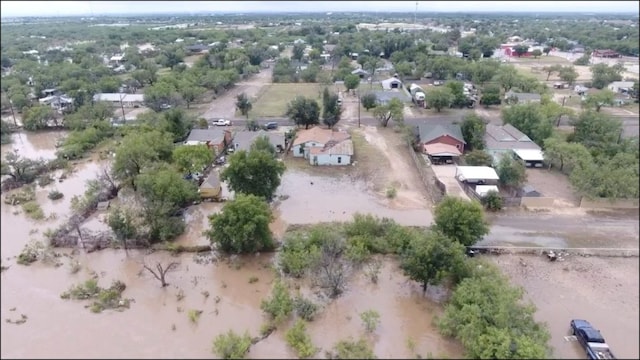 A drone view shows houses flooded following torrential rains in Texas. (Reuters)