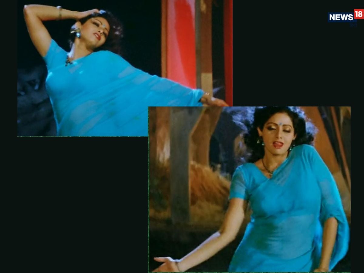 Sridevi’s cobalt blue chiffon saree in the song Kaate Nahi Katte from Mr. India remains one of the most memorable saree moments in cinema. Shot against monsoon backdrops, the look set benchmarks in saree styling and continues to inspire costume designers. (News18 Hindi) Sridevi’s cobalt blue chiffon saree in the song Kaate Nahi Katte from Mr. India remains one of the most memorable saree moments in cinema. Shot against monsoon backdrops, the look set benchmarks in saree styling and continues to inspire costume designers. (News18 Hindi)