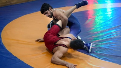Aman Sehrawat (in blue). (PTI Photo)