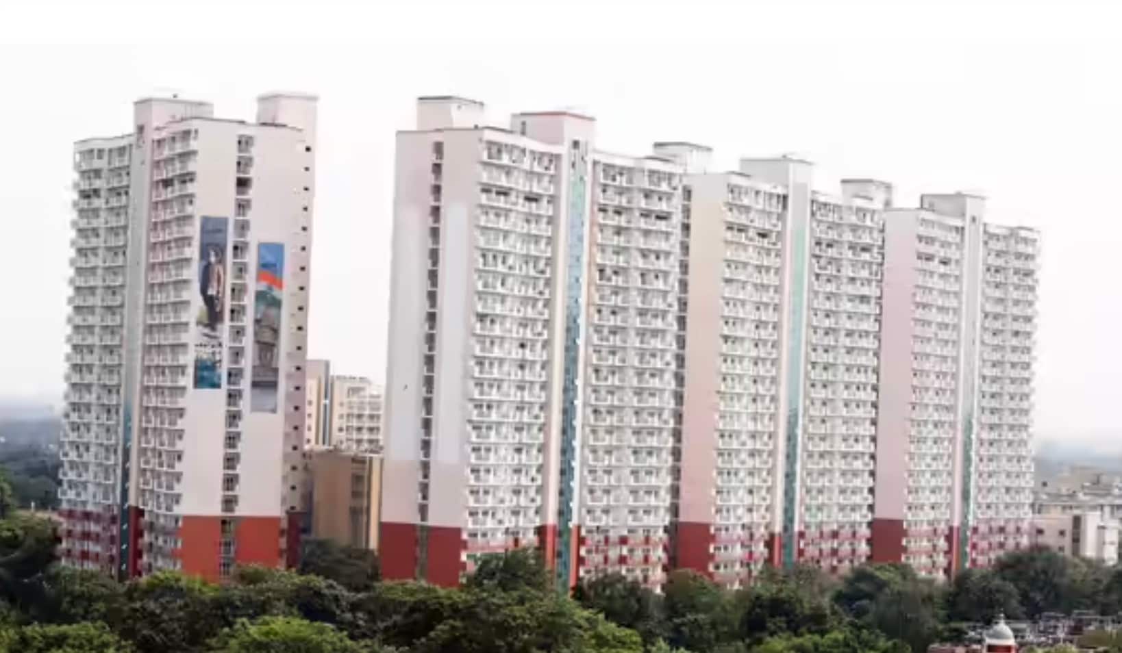Beyond individual flats, the complex offers a six-storey amenity block featuring a canteen, gym, yoga space, community hall, dispensary, service centre, guest rooms, shops, and club facilities. Parking is ample, with two basement levels accommodating up to 612 vehicles across different areas. Beyond individual flats, the complex offers a six-storey amenity block featuring a canteen, gym, yoga space, community hall, dispensary, service centre, guest rooms, shops, and club facilities. Parking is ample, with two basement levels accommodating up to 612 vehicles across different areas.