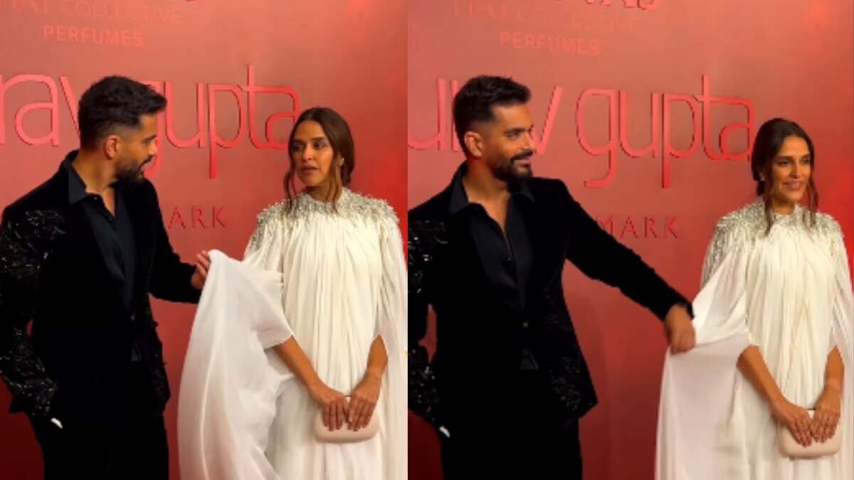Angad Bedi Helps Neha Dhupia at Red Carpet Event