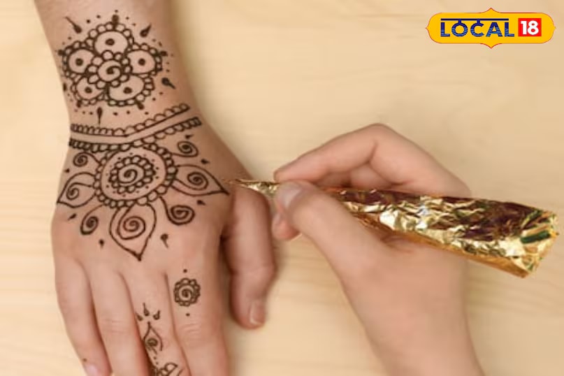 Let mehndi dry naturally without using dryers or fans, and never wash it with water immediately. Instead, apply oil before gently scraping it off, and avoid water for at least half an hour afterwards. These simple steps will ensure your mehndi is dark, beautiful, and long-lasting. (News18 Hindi) 