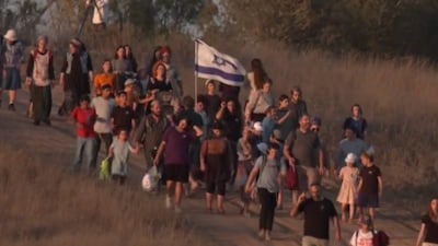 Video footage of the event, shared by AFP, shows hundreds of settlers waving Israeli flags and orange banners associated with Gush Katif.