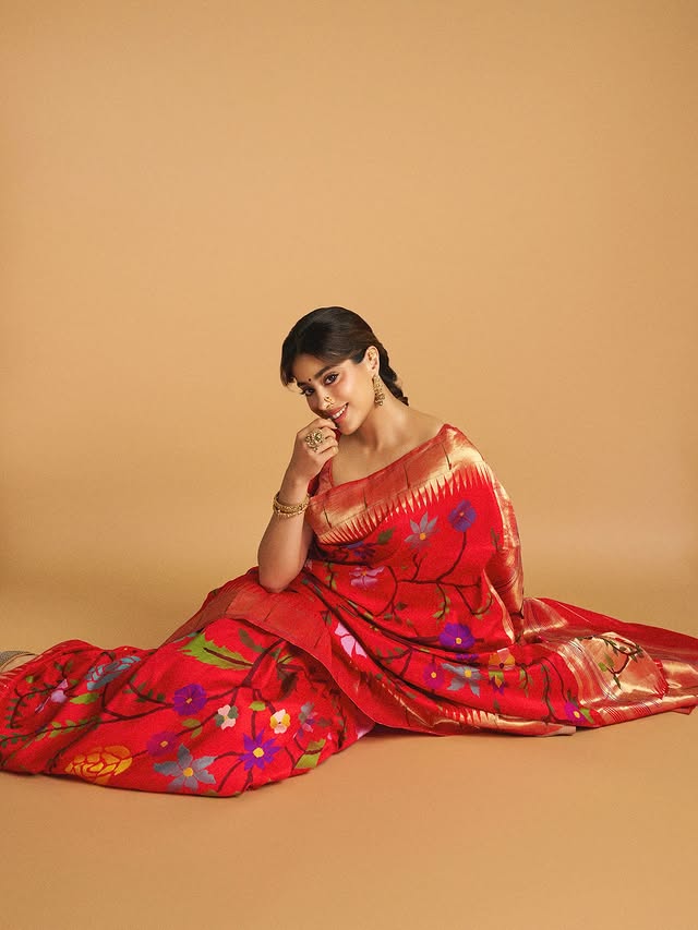 Janhvi Kapoor: Param Sundari actress stunned in a timeless handloom Paithani saree crafted in vibrant red and opulent gold was accentuated with a bouquet of floral motifs in myriad color combinations. Janhvi Kapoor: Param Sundari actress stunned in a timeless handloom Paithani saree crafted in vibrant red and opulent gold was accentuated with a bouquet of floral motifs in myriad color combinations.