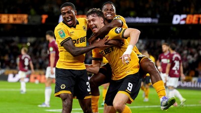 Wolves' Jorgen Strand Larsen (center) celebrates with teammates after scoring a goal against West Ham. (AP Photo)