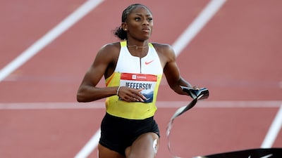 Melissa Jefferson-Wooden crossing the finish line. (AFP)