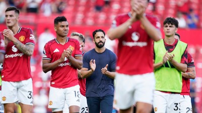Manchester United's players and manager Ruben Amorim (AP)