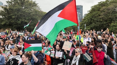 Members of the Palestine Action Group gather ahead of a rally in Sydney, Australia. (File photo/REUTERS)