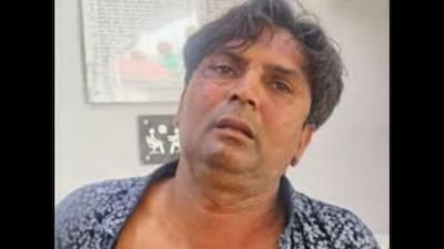The assailant, Rajesh Khimji Sakariya from Rajkot, handed her some papers before shouting abuses and slapping the CM. (News18 Hindi)