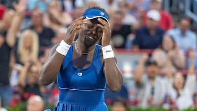Victoria Mboko, of Canada, reacts following her win over Coco Gauff, of the United States, during round of 16 match action at the National Bank Open women's tennis tournament in Montreal, Saturday, Aug. 2, 2025. (Christinne Muschi/The Canadian Press via AP)
