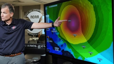 Jamie Rhome, deputy director of the National Hurricane Centre, gives an update on Tropical Storm Erin at the National Hurricane Centre in Miami. (AP Photo)