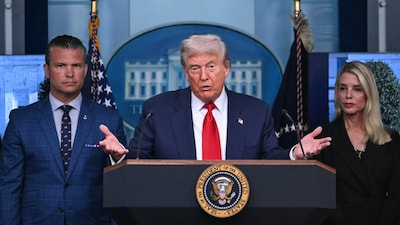 US President Donald Trump, alongside Defence Secretary Pete Hegseth (L) and Attorney General Pam Bondi (R) at the White House in Washington. (AFP photo)
