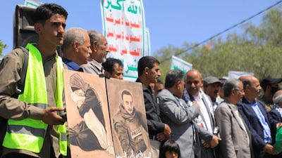 Sanaa University students and professors attend a rally to denounce the killing of an Al Jazeera news team in an Israeli strike in Gaza City. (AFP photo)