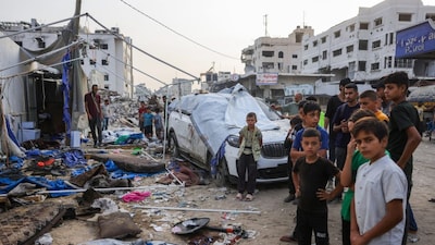 Palestinians check the destroyed Al Jazeera tent at Al-Shifa Hospital in Gaza City on August 11, 2025, following an overnight strike by the Israeli military. (AFP photo)