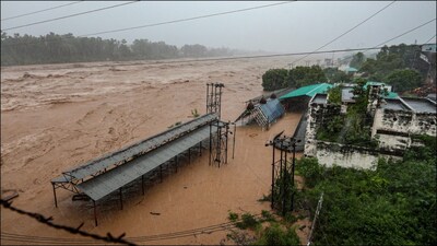 Structures partially submerged following heavy rainfall, in Jammu (PTI)