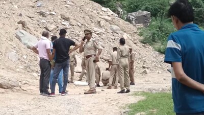 Cops at the site where the young woman's body was recovered after she was killed allegedly by her brother. (News18)