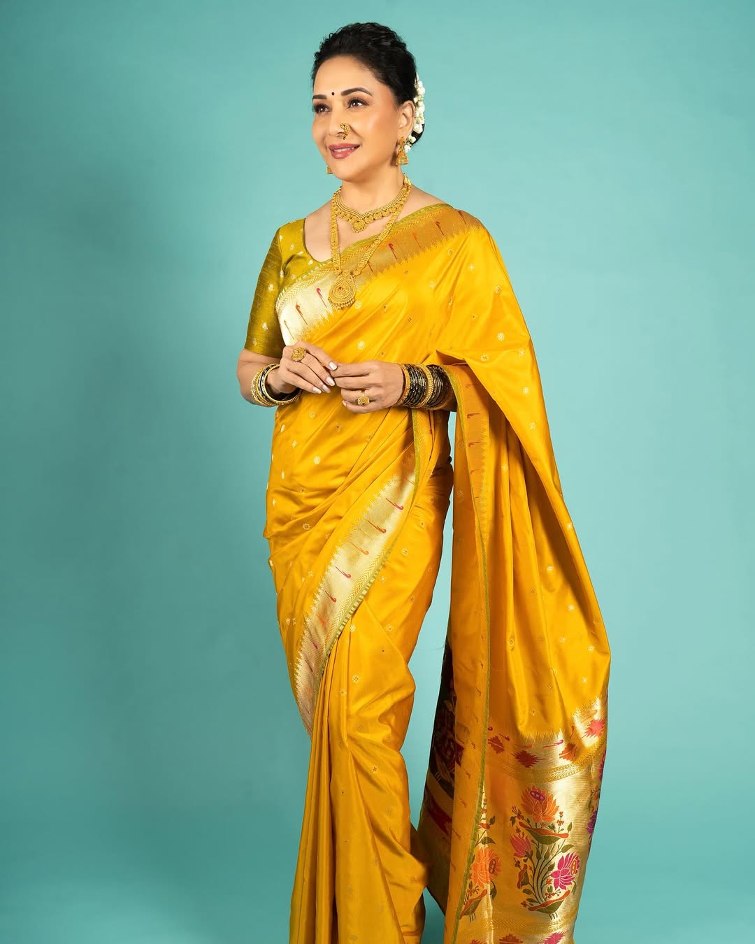 Madhuri Dixit-Inspired Saree Blouse Designs For Ganesh Chaturthi Celebration Madhuri Dixit-Inspired Saree Blouse Designs For Ganesh Chaturthi Celebration