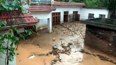 Debris and mud accumulated in a residential area following a cloudburst, in Kathua on Sunday. (PTI)