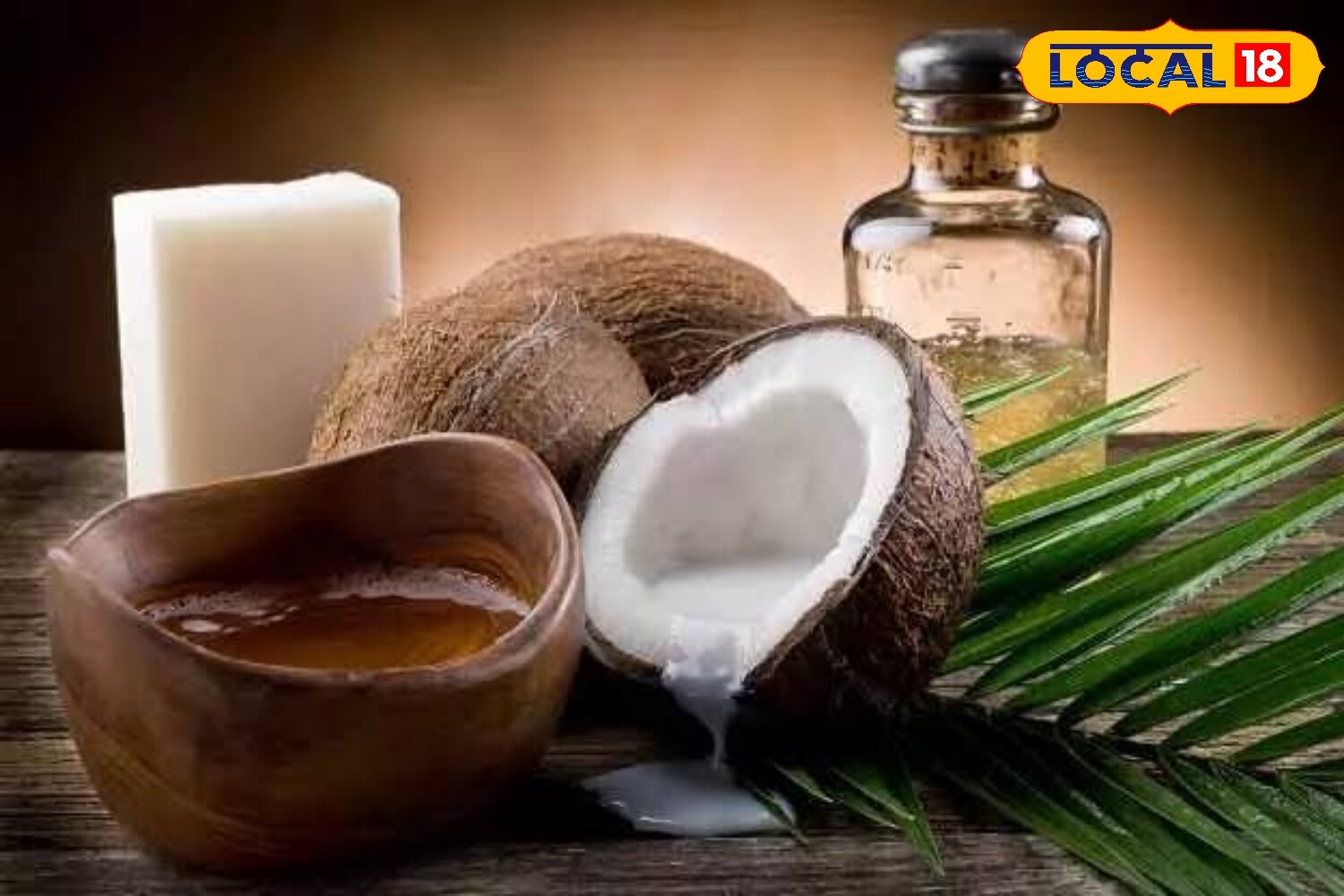 Coconut oil: Known for its skin benefits, coconut oil can be gently massaged daily over the affected area. With regular use, the mole’s colour gradually fades, and in some cases, it may disappear over time. (News18 Hindi) Coconut oil: Known for its skin benefits, coconut oil can be gently massaged daily over the affected area. With regular use, the mole’s colour gradually fades, and in some cases, it may disappear over time. (News18 Hindi)