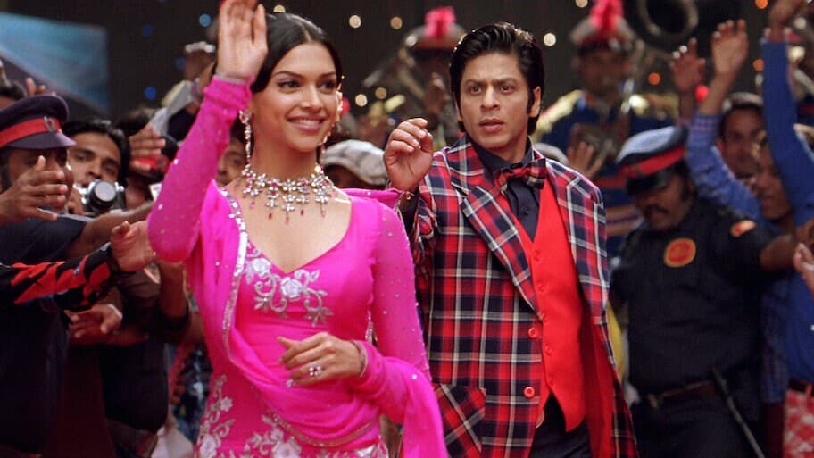 Om Shanti Om (2007): A musical drama written and directed by Farah Khan, co-written by Mayur Puri and Mushtaq Sheikh, and produced by Gauri Khan, this film starred Shah Rukh Khan and Deepika Padukone in her Bollywood debut. Featuring a story based on reincarnation, the film also included Shreyas Talpade, Kirron Kher and Arjun Rampal, and became the highest-grossing film of 2007. (News18 Hindi)
