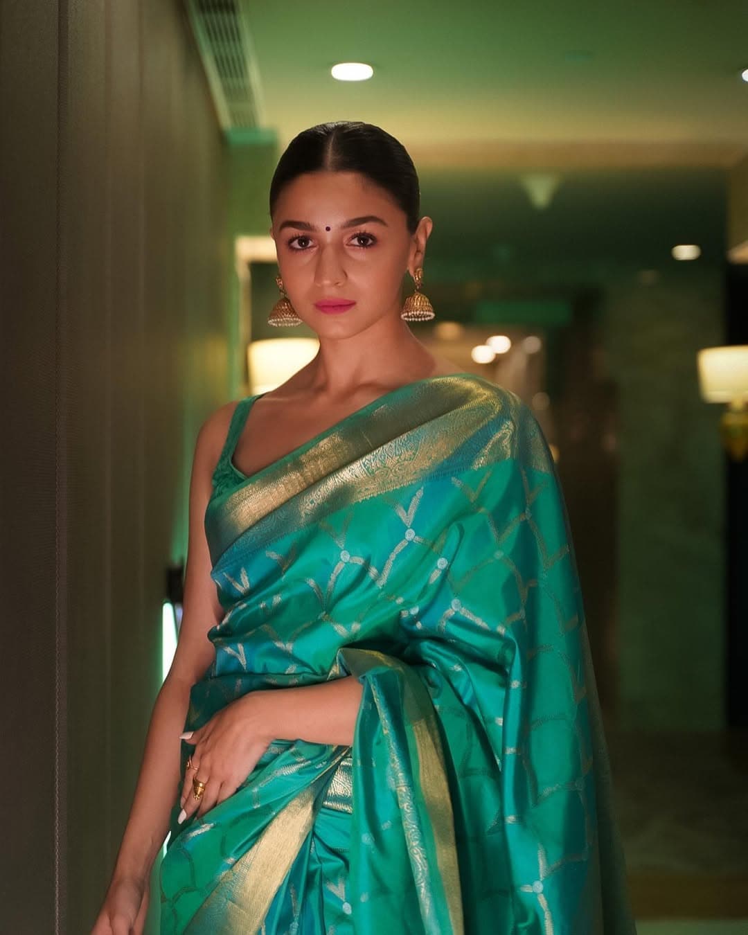 Alia Bhatt: Bring Alia Bhatt’s classic charm to your look with a traditional saree and sleeveless blouse combo. (Image: Instagram) Alia Bhatt: Bring Alia Bhatt’s classic charm to your look with a traditional saree and sleeveless blouse combo. (Image: Instagram)