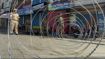 Security personnel stand guard near a market area in Doda district, Jammu and Kashmir. (IMAGE: PTI/REPRESENTATIVE FILE) 