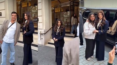 Aishwarya Rai consoles a tearful fan in Paris.