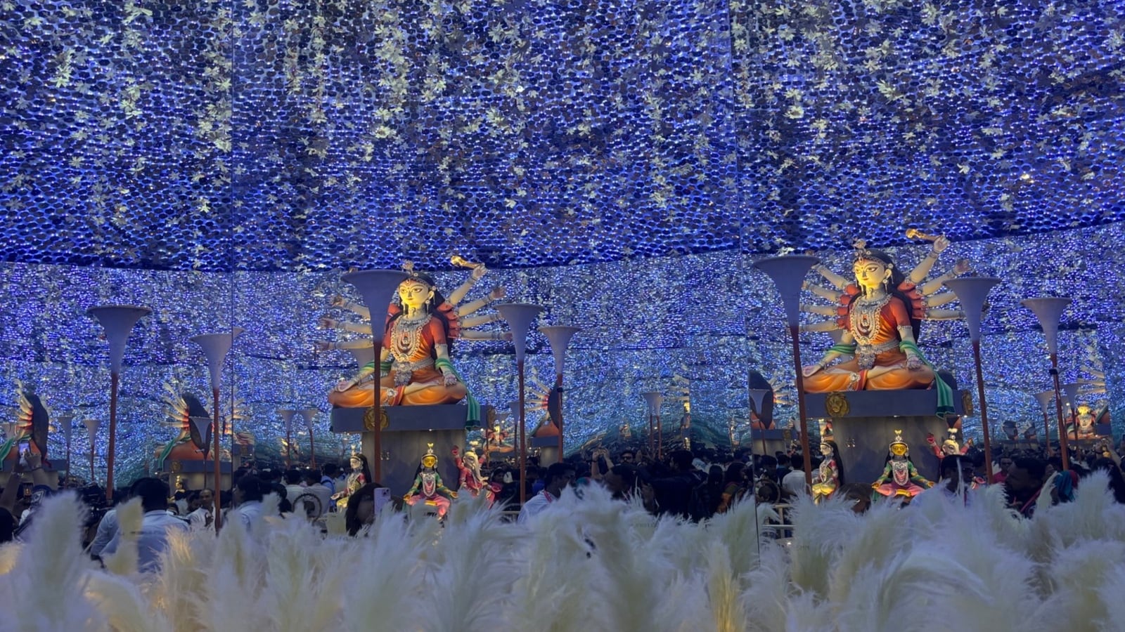 Every autumn, when the rhythm of dhaak fills the air and the fragrance of shiuli blossoms announces the arrival of Durga Puja, Delhi’s Chittaranjan Park transforms into a living postcard of Bengal. This South Delhi neighbourhood is the closest one can get to the grandeur of Kolkata’s celebrations without leaving the capital. Here, devotion and nostalgia come together in dazzling pandals, cultural programmes, and streets buzzing with festive adda. Every autumn, when the rhythm of dhaak fills the air and the fragrance of shiuli blossoms announces the arrival of Durga Puja, Delhi’s Chittaranjan Park transforms into a living postcard of Bengal. This South Delhi neighbourhood is the closest one can get to the grandeur of Kolkata’s celebrations without leaving the capital. Here, devotion and nostalgia come together in dazzling pandals, cultural programmes, and streets buzzing with festive adda.