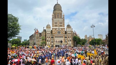 Supporters of activist Manoj Jarange Patil, who is on hunger strike demanding Maratha reservation, gather outside Chhatrapati Shivaji Maharaj Terminus to join his agitation. (PTI)