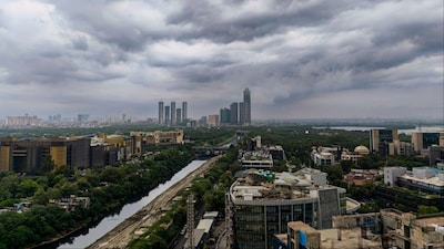 Dark clouds cover the city skyline, in Noida (Photo: PTI)